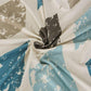 Housse extensible pastel sur canapé droit, vue de face