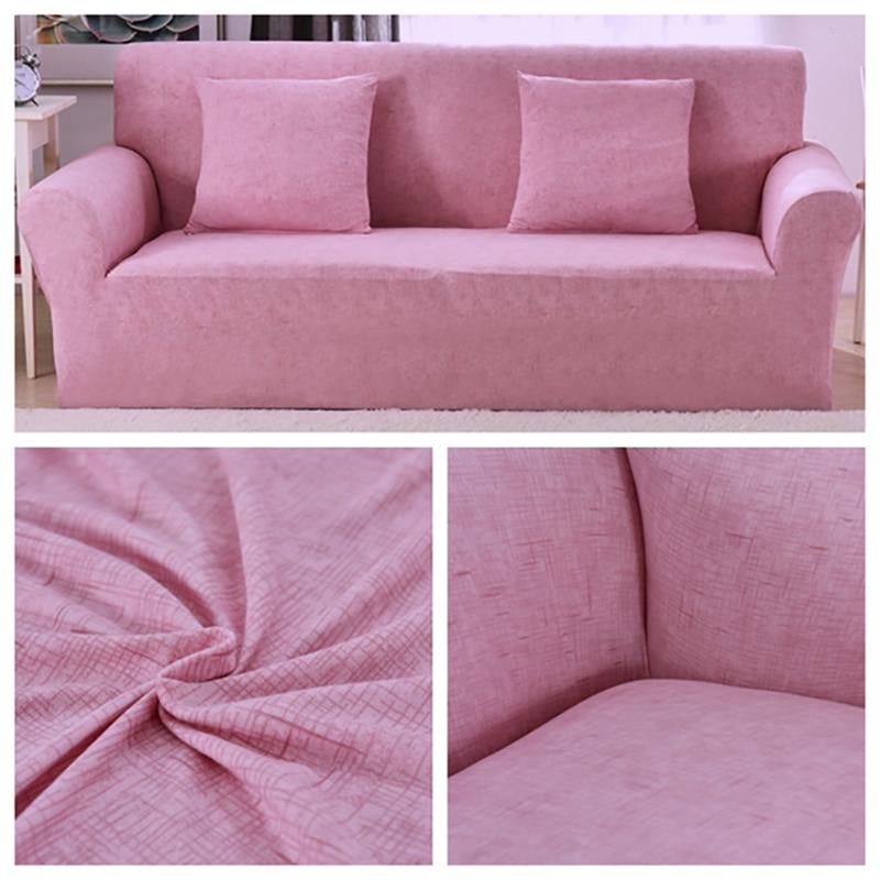 Housse de canapé rose extensible sur canapé droit