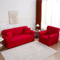 Housse de canapé rouge extensible sur un canapé droit