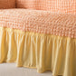 Vue rapprochée du tissu extensible de la housse saumon