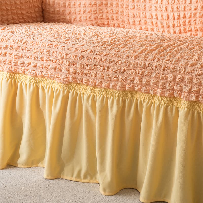 Vue rapprochée du tissu extensible de la housse saumon