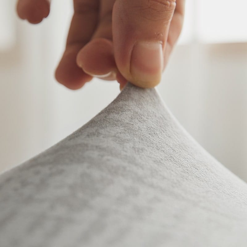 Installation facile de la housse sur un canapé d'angle