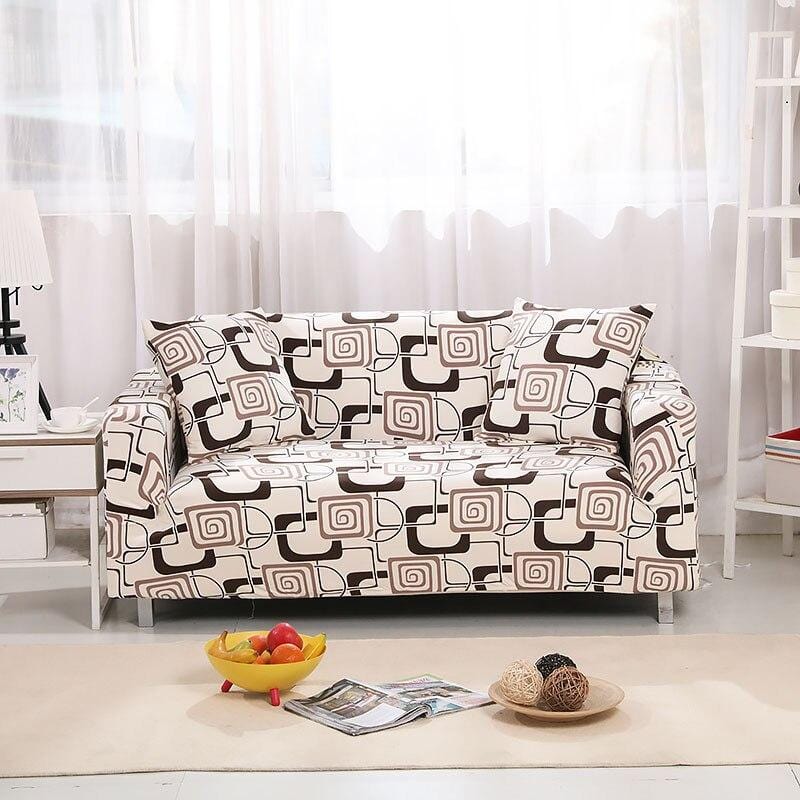 Housse extensible beige sur canapé moderne en salon lumineux