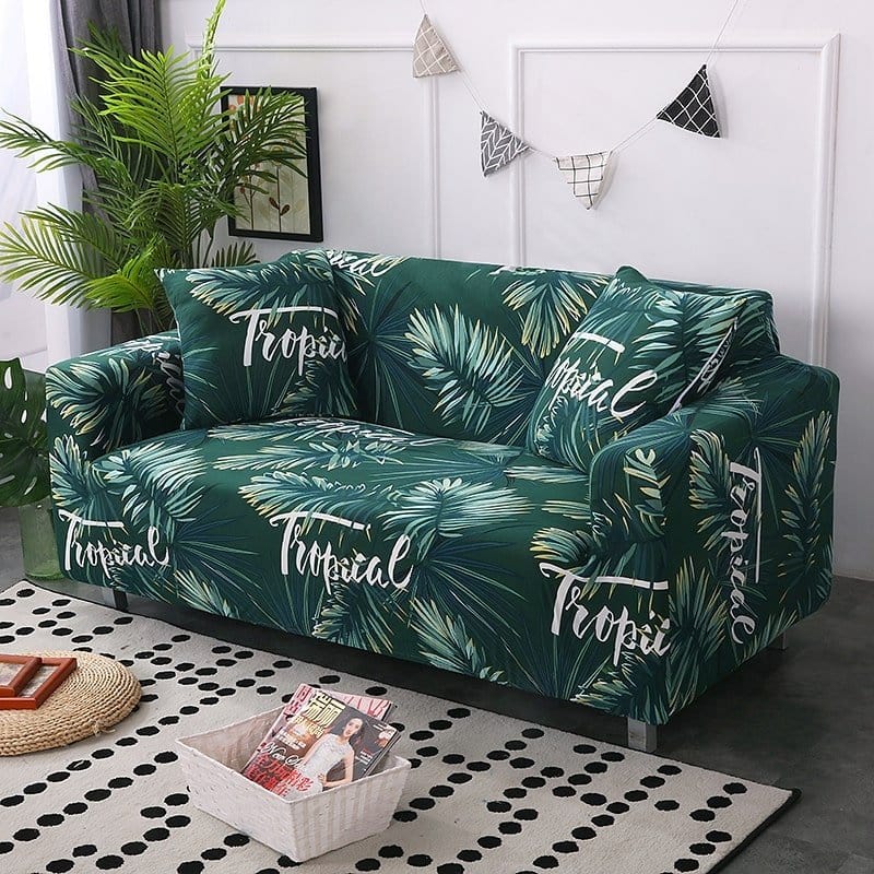 Housse de canapé tropicale sur un canapé droit