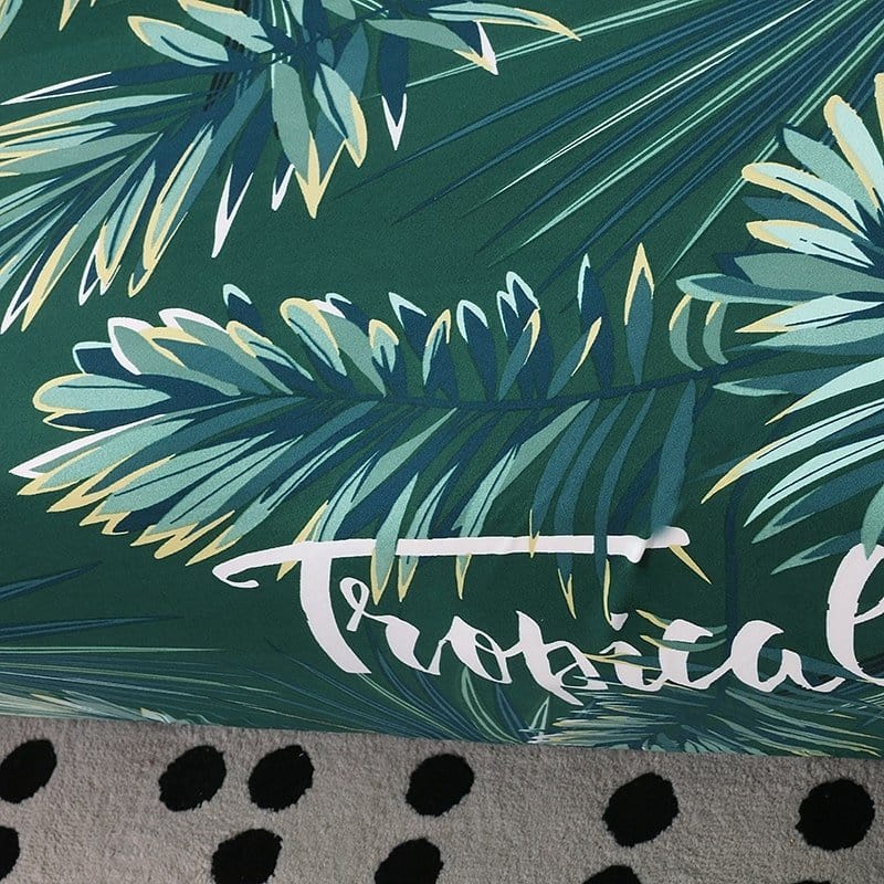 Détail du tissu extensible à motif tropical