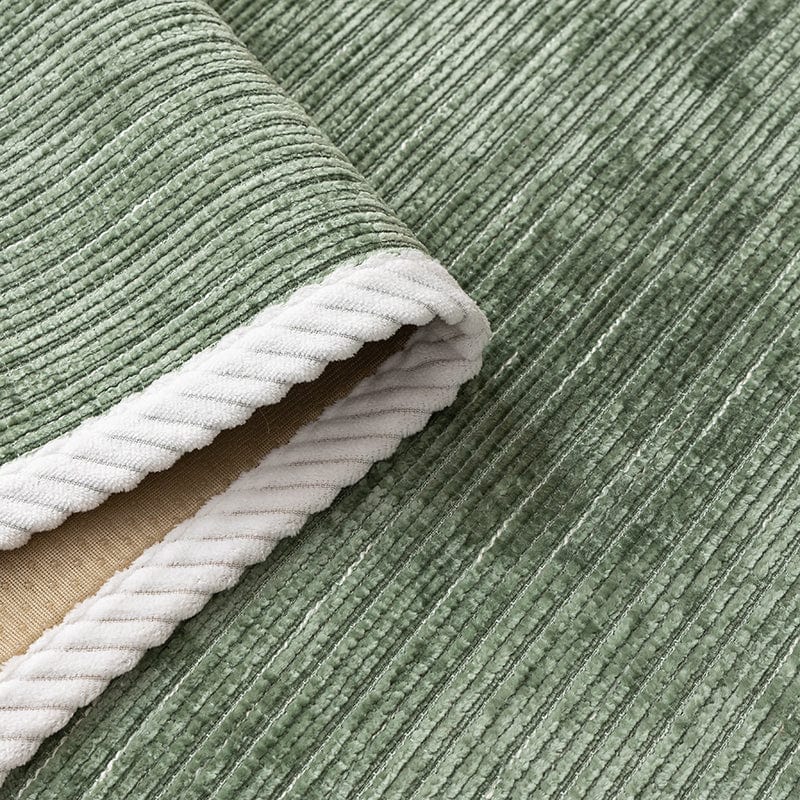 Housse de canapé en tissu chenillé vert, effet structuré