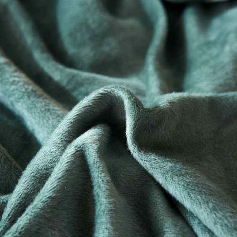 Housse extensible en velours vert, vue latérale