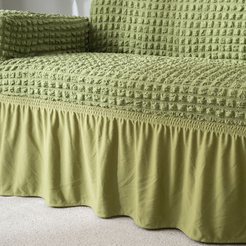 Vue rapprochée du tissu extensible vert de la housse