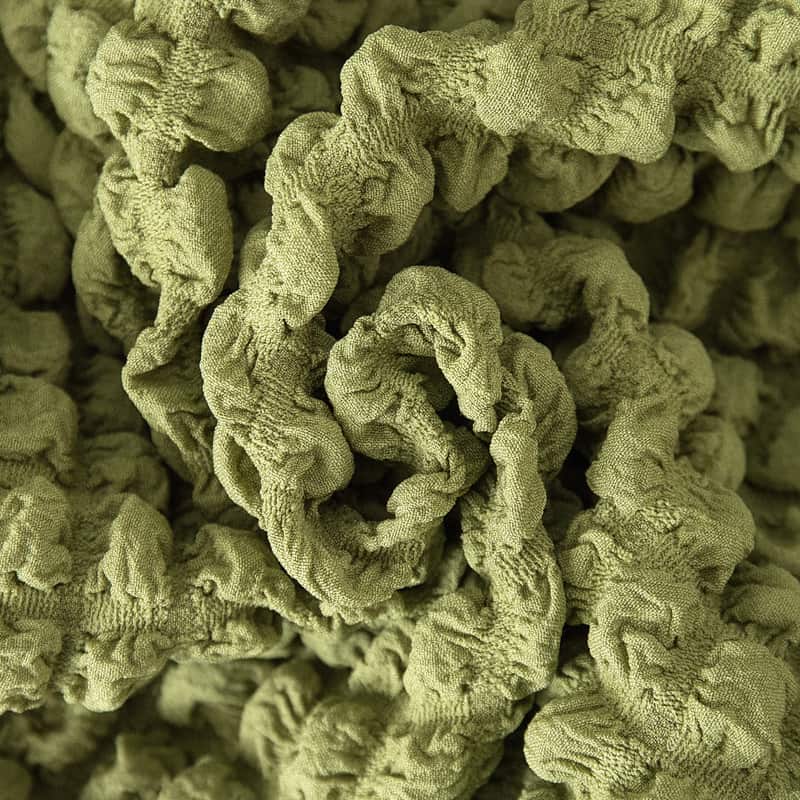 Texture douce et extensible de la housse de canapé
