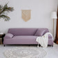Détail du tissu jacquard violet, montrant sa douceur et son élasticité