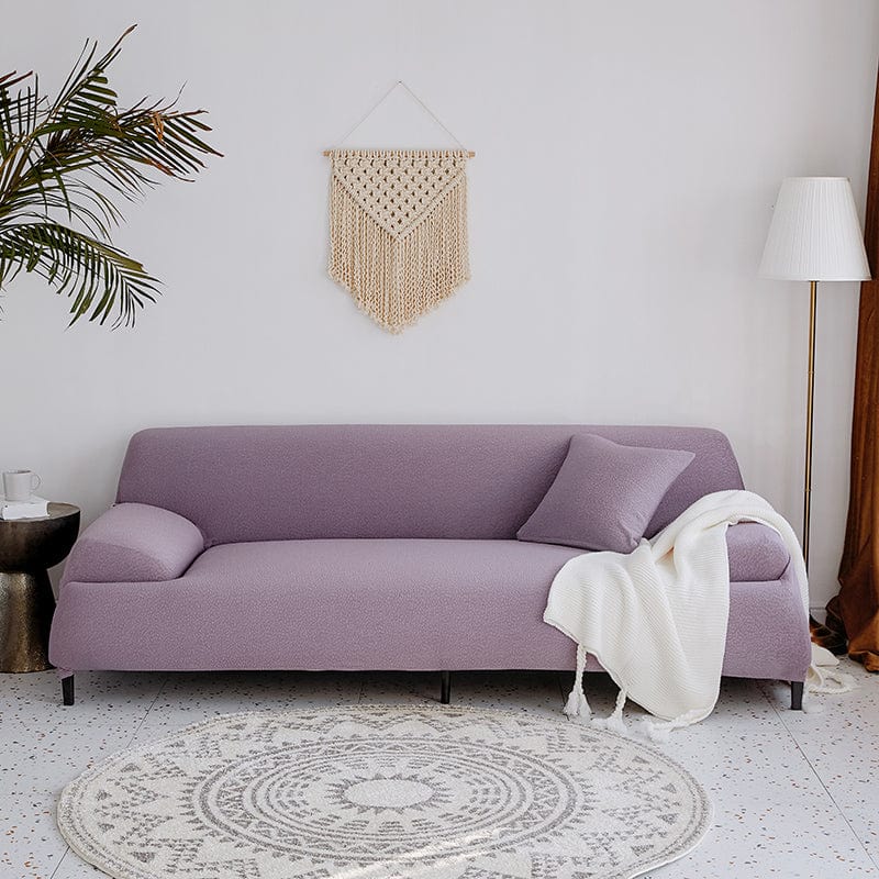 Détail du tissu jacquard violet, montrant sa douceur et son élasticité
