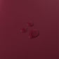 Housse en similicuir bordeaux, ajustée sur une chaise moderne