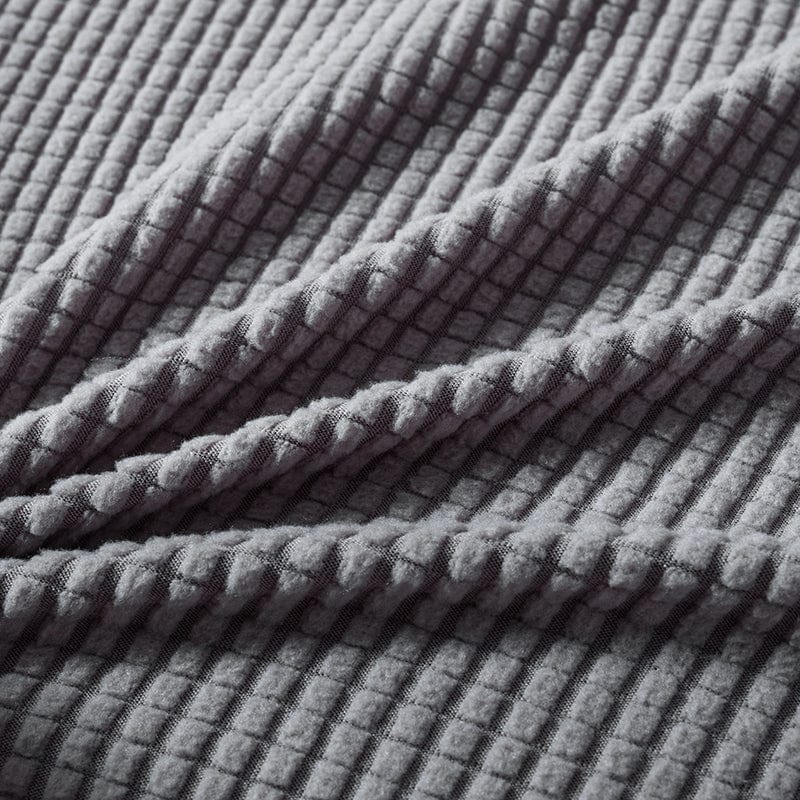 Vue rapprochée de la texture jacquard de la housse