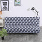 Housse extensible beige sur canapé-lit en mode assis