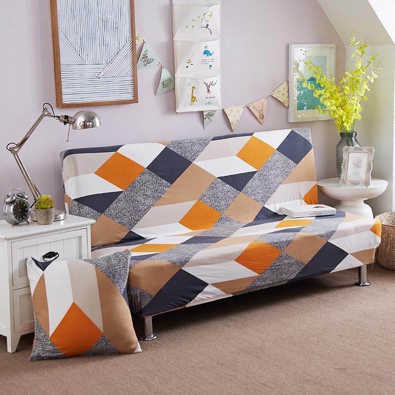 Housse extensible grise sur canapé-lit en position fermée