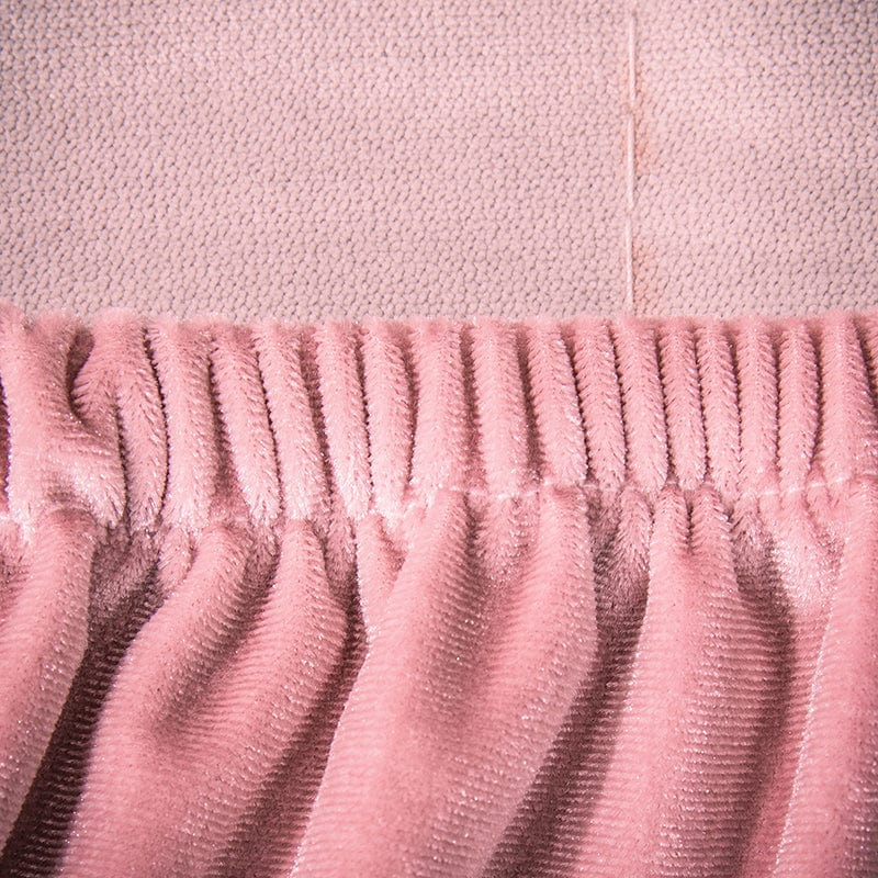 Vue latérale de la housse en velours rose sur un clic clac