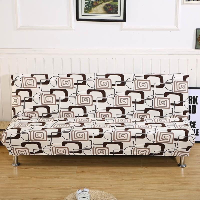 Housse extensible sur canapé-lit, motif seventies coloré