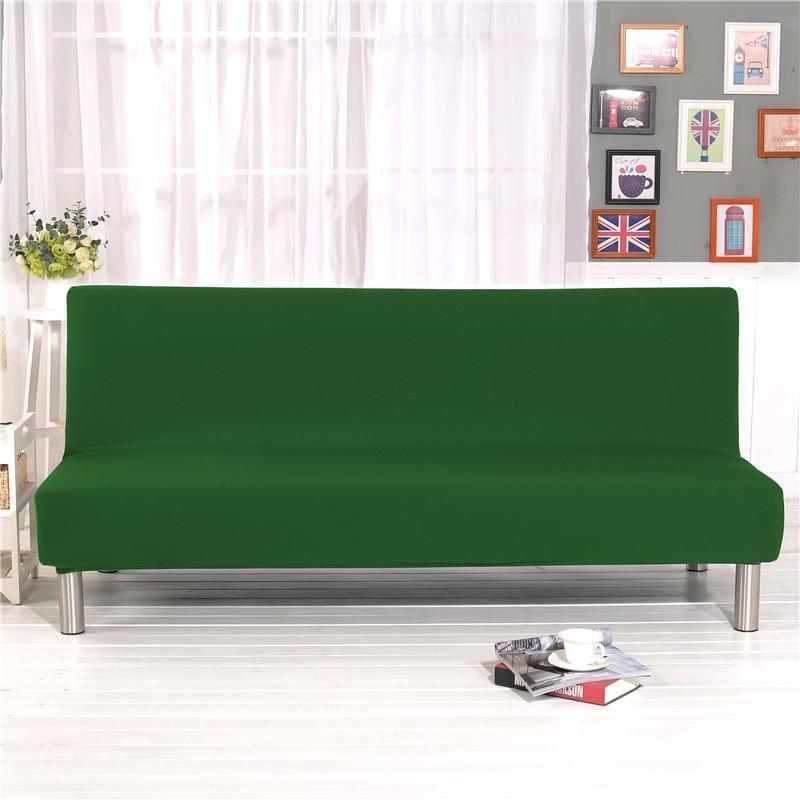 Housse extensible vert foncé sur canapé-lit, vue de face