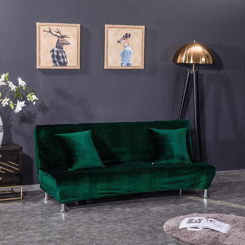Housse de clic clac en velours vert sur canapé-lit