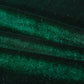 Vue latérale d'un canapé-lit recouvert de velours vert