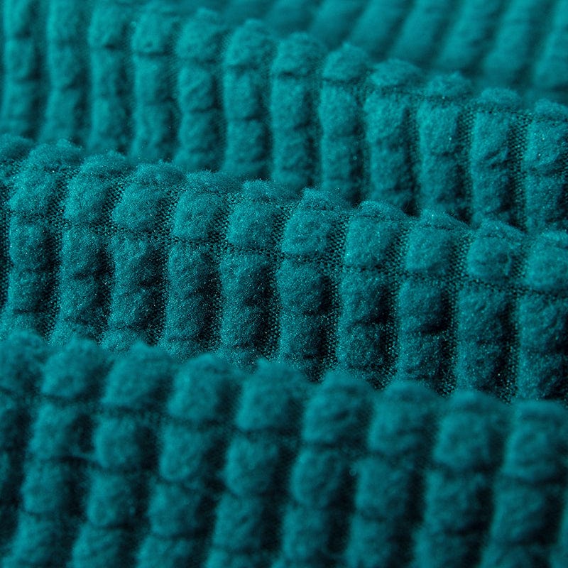 Gros plan sur la texture jacquard de la housse de canapé-lit