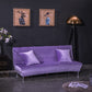 Housse de clic clac en velours violet sur canapé-lit