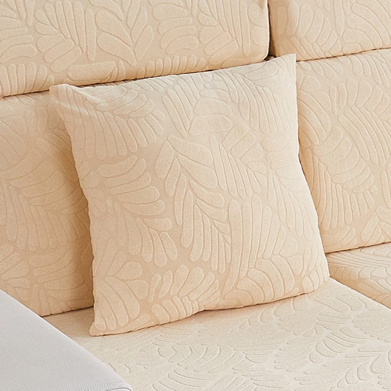 Housse de coussin beige avec motif palmier, vue de face