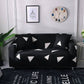 Deux housses de coussin extensibles noir et blanc sur canapé