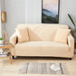 Housse de coussin beige et rose sur canapé