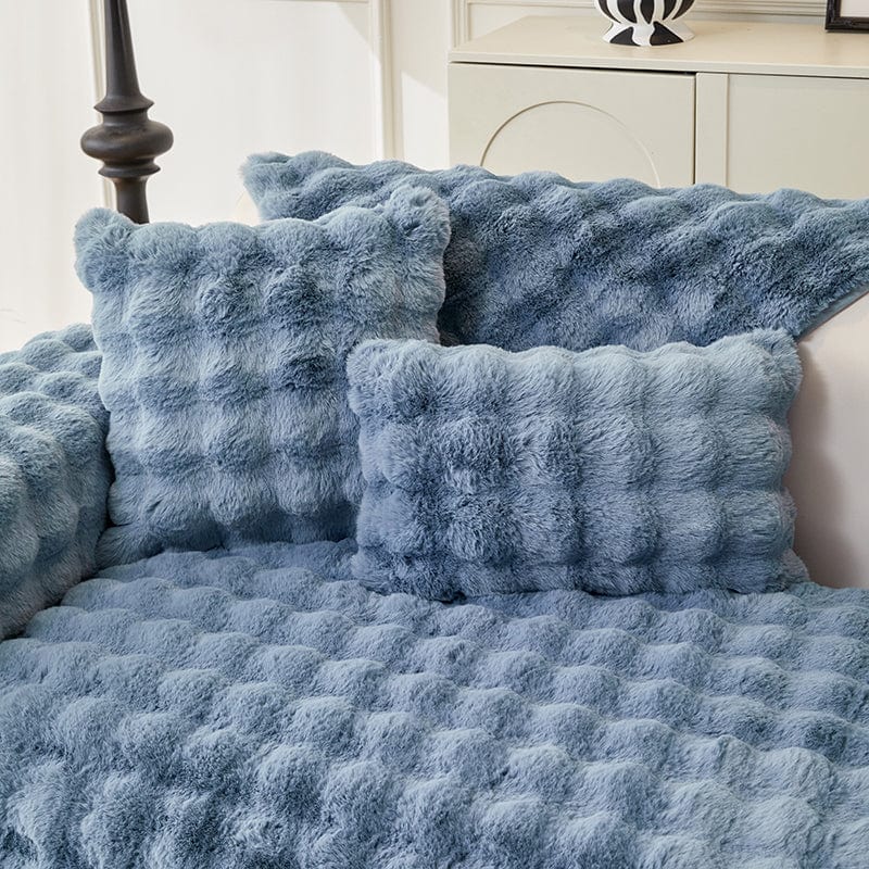 Gros plan sur texture douce de housse de coussin bleue