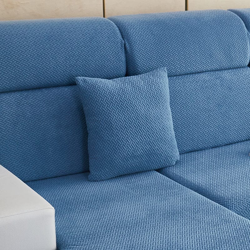Housse de coussin bleu ciel avec motif en laine, vue de face