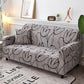 Deux housses de coussin marron en tissu extensible