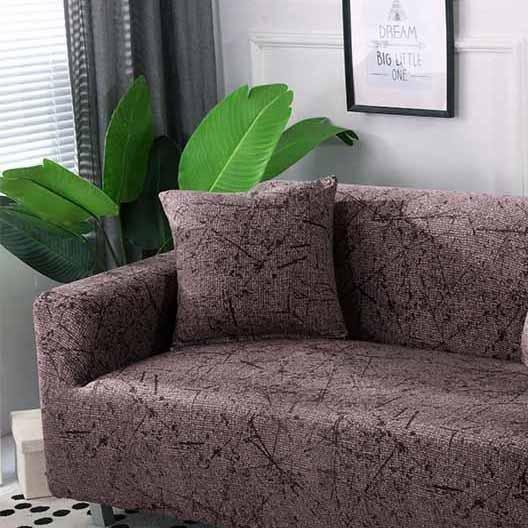 Gros plan sur le tissu extensible des housses de coussin marron
