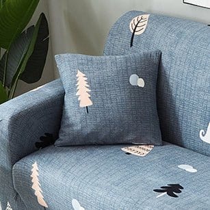 Housses de coussin extensibles grises sur canapé moderne