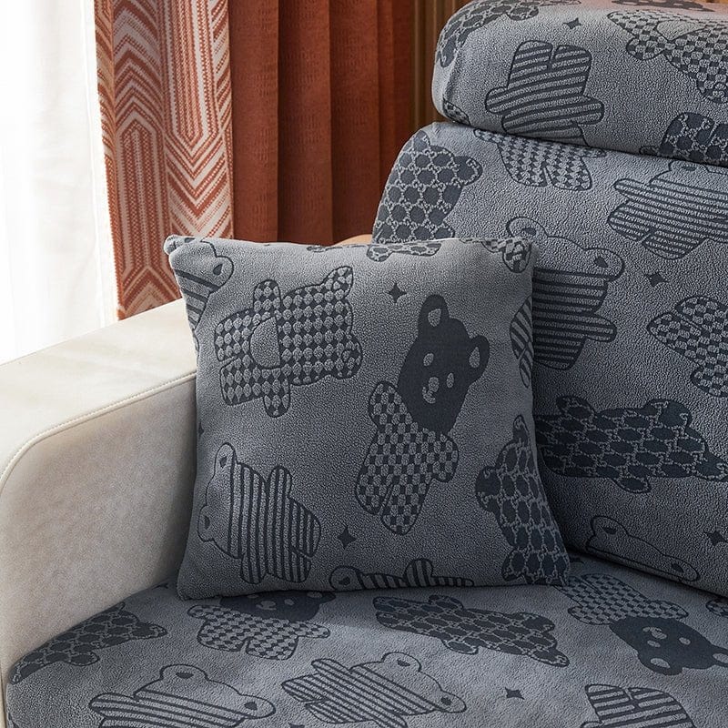Deux housses de coussin grises en polaire extensible sur fond blanc