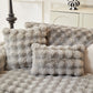 Gros plan sur texture douce de housse de coussin en fausse fourrure