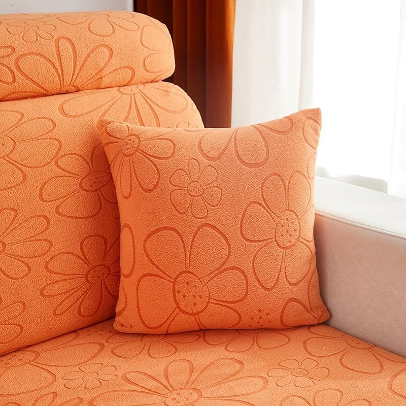 Housses de coussin orange avec motif floral, vue de face