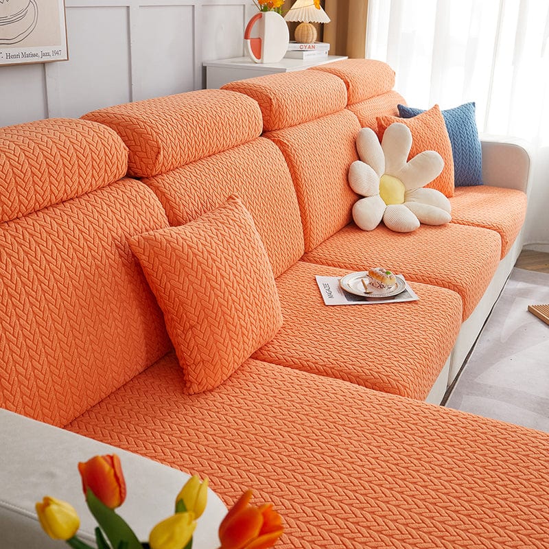 Housse de coussin en laine orange avec motif géométrique