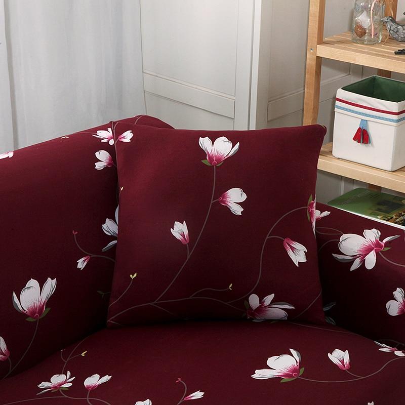 Gros plan sur texture florale rouge de la housse de coussin