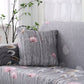 Gros plan sur texture antidérapante d'une housse de coussin grise
