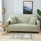 Housse de coussin verte imperméable sur canapé beige