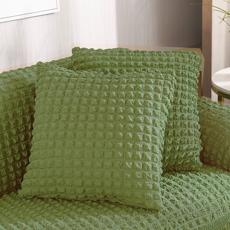 Deux housses de coussin vertes sur fond blanc, 45x45 cm