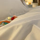 Zoom sur le tissu respirant de la housse de couette