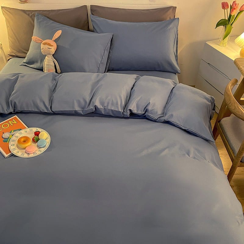 Détail du tissu polyester bleu de la housse de couette