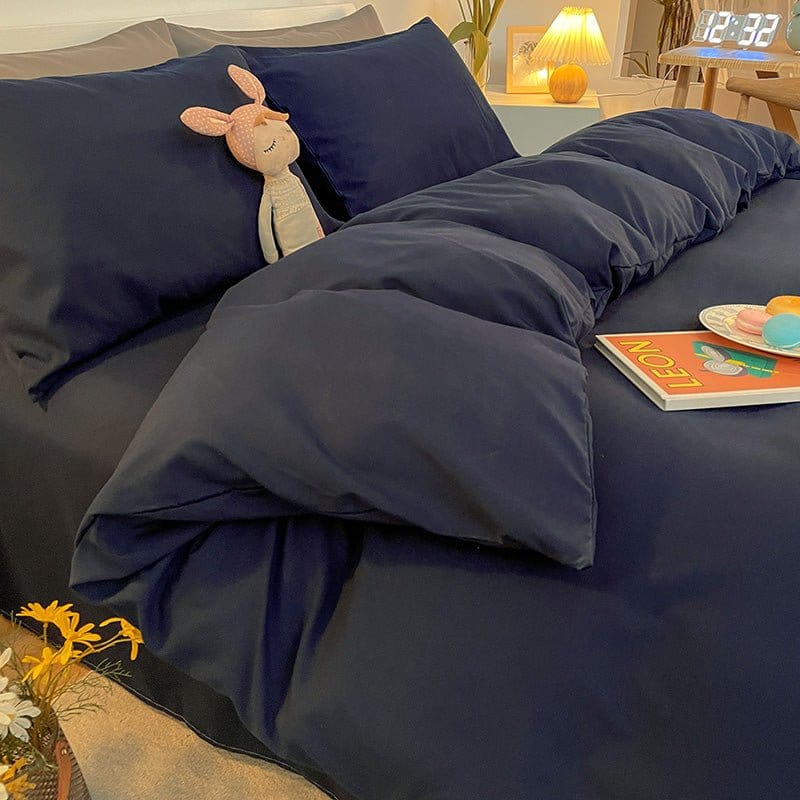 Vue latérale d'un lit avec housse de couette bien ajustée
