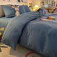 Housse de couette lavable en machine sur un lit