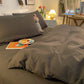 Gros plan sur les coutures de la housse de couette