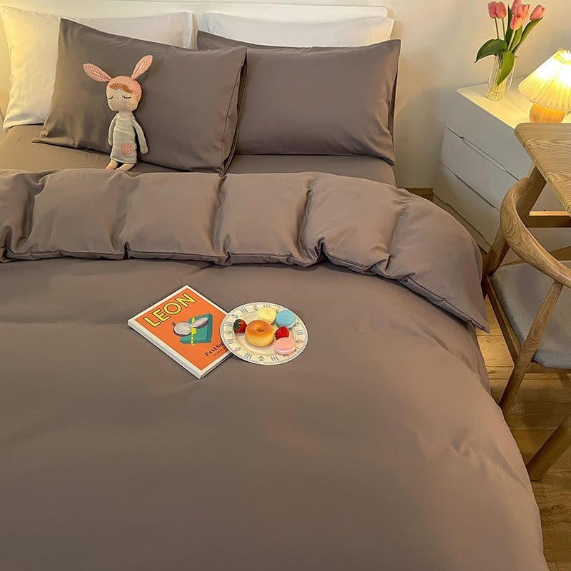 Housse de couette grise pliée, montrant sa qualité supérieure