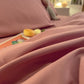 Détail de la fermeture à glissière de la housse de couette rose