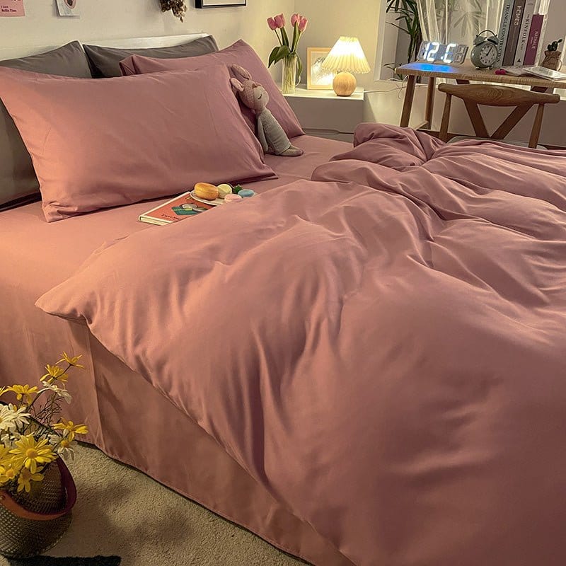 Housse de couette rose montrant sa qualité et finition soignée